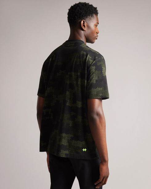 TUGO-Tops-Made from 100% cotton and in a relaxed fit, TUGO perfect for weekend lounging. This quirky camo tee features a relaxed fit, crew neck and short sleeves. Team with jeans and trainers for an easy weekend look.By choosing Ted Baker cotton products, you're supporting our investment in the Better Cotton Initiative's mission. This product is sourced via a system of mass balance and therefore may not contain Better Cotton. T-shirt 100% cotton Relaxed fit Camo jigsaw print Short sleeved Crew neck Grace is